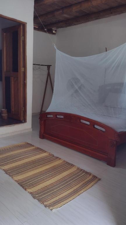 Una cama o camas en una habitación de Cabaña Buenos Aires
