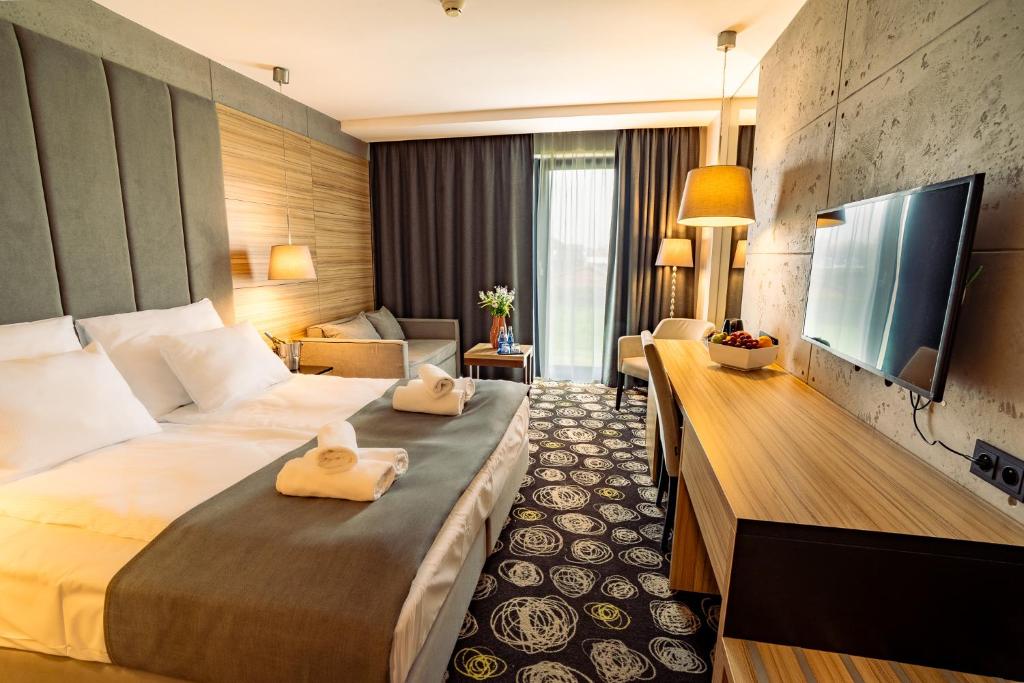 TV a/nebo společenská místnost v ubytování Mielenko & Spa ex Baltin Hotel