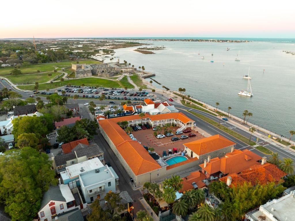 an aerial view of a city and the water at Best Western Historic Bayfront in Saint Augustine