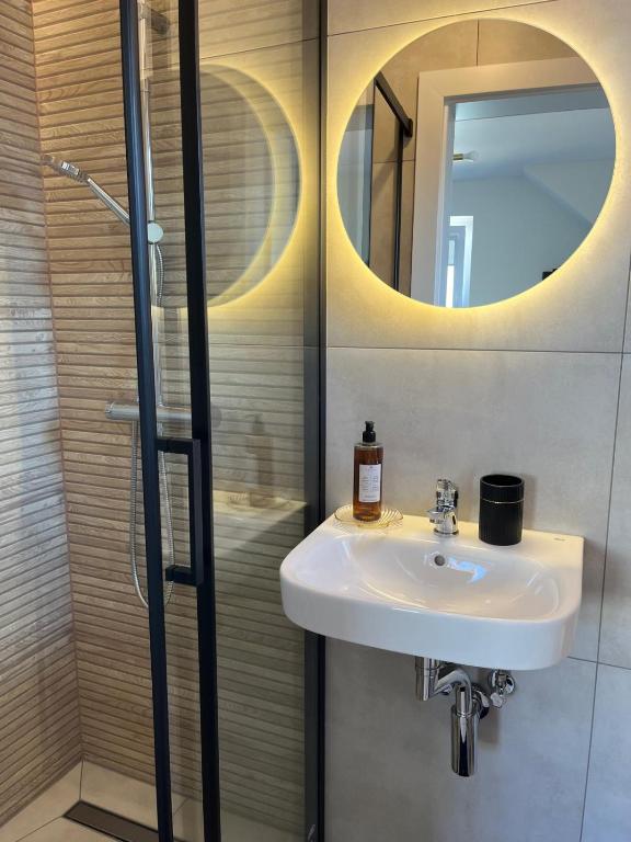 Kúpeľňa v ubytovaní Karwia Pokoje & Apartamenty