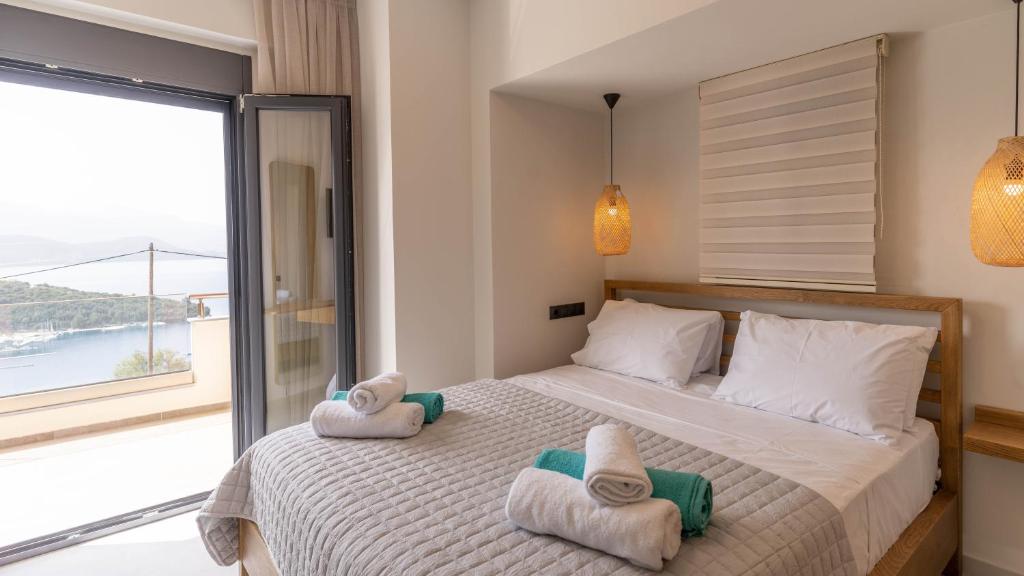 Postel nebo postele na pokoji v ubytování Adaman Villas