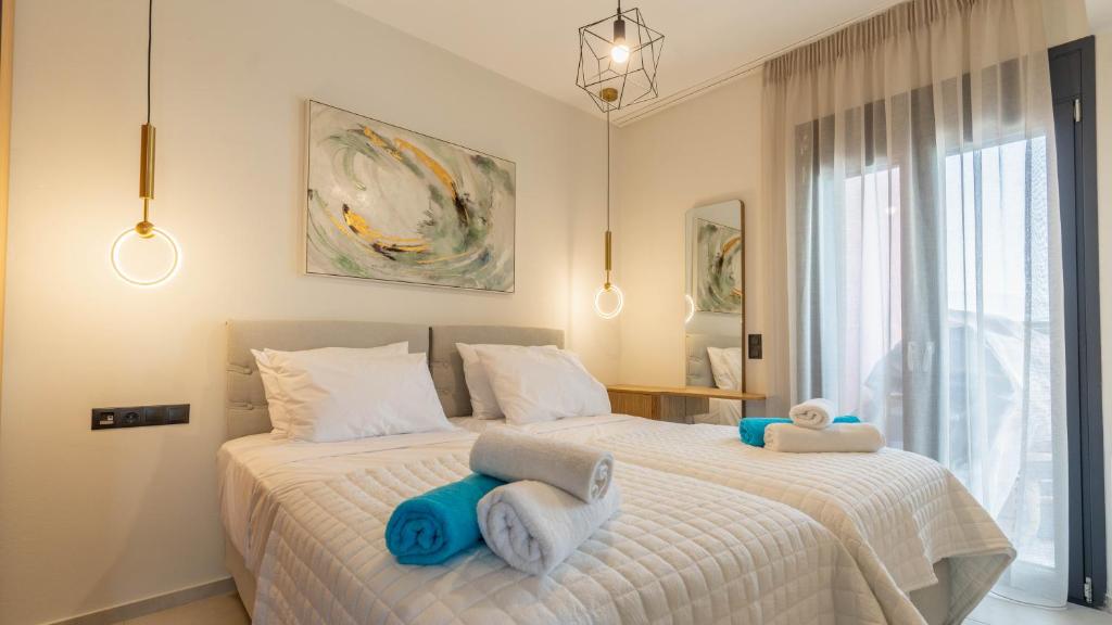 Postel nebo postele na pokoji v ubytování Adaman Villas