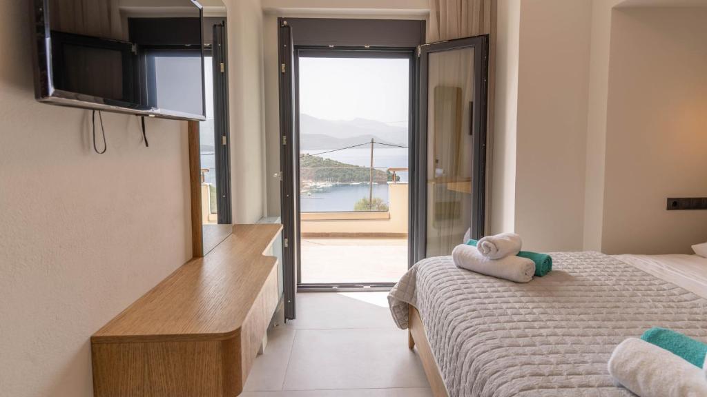 Postel nebo postele na pokoji v ubytování Adaman Villas