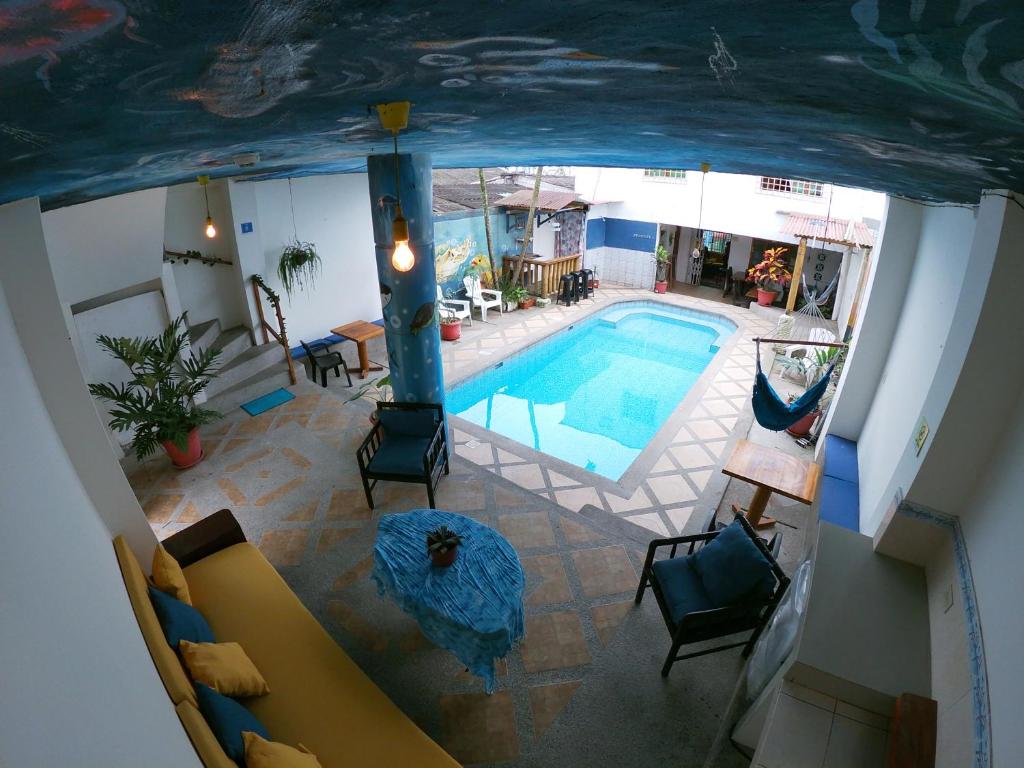 an overhead view of a swimming pool in a house at Hotel Estación del Sol in Las Núñez