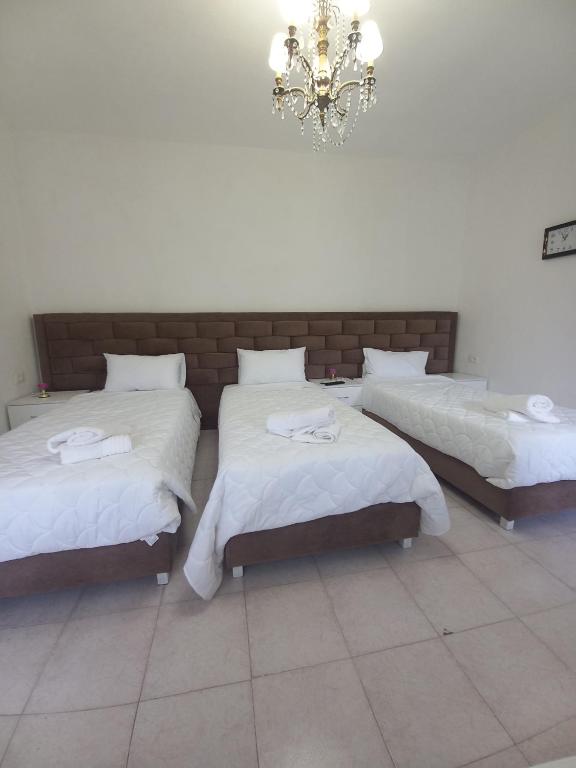 Postel nebo postele na pokoji v ubytování Aleko Guest House