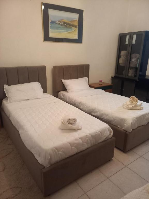 Postel nebo postele na pokoji v ubytování Aleko Guest House