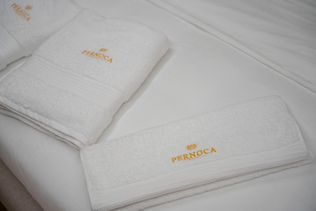Postel nebo postele na pokoji v ubytování Hotel Pernoca