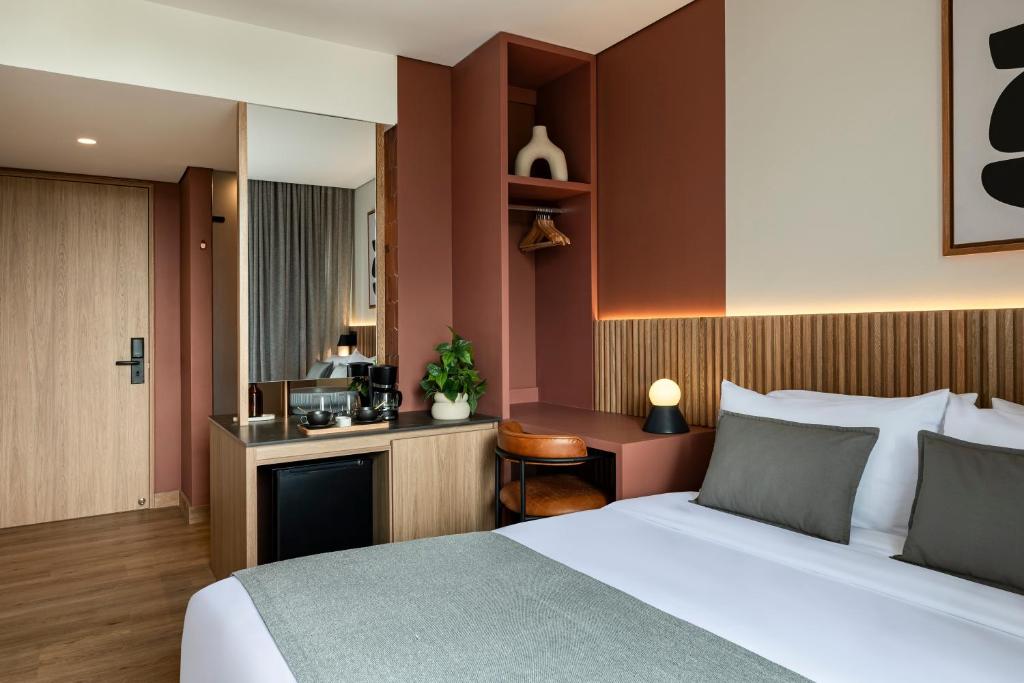 Postel nebo postele na pokoji v ubytování Heiss Hotel
