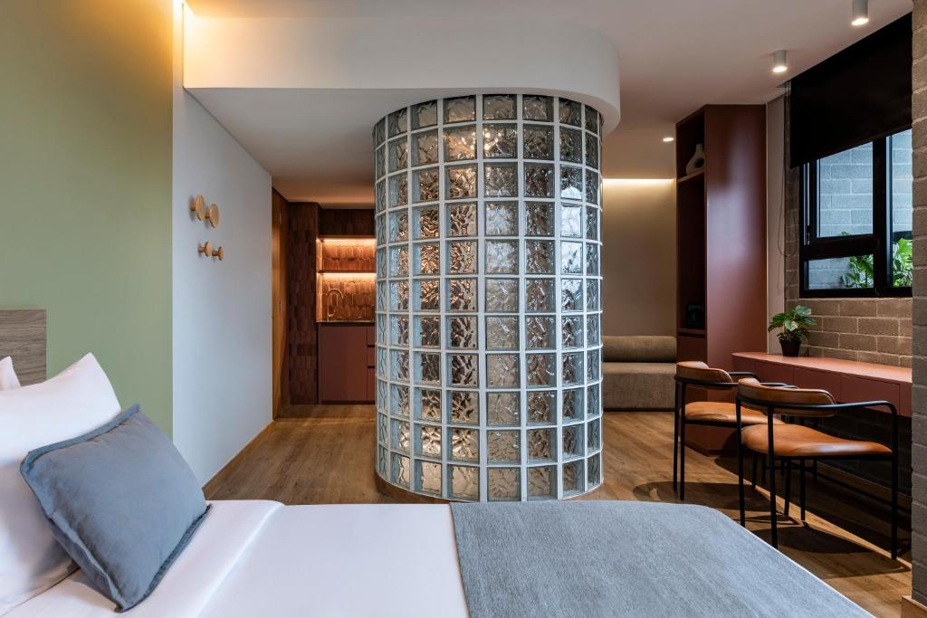 Postel nebo postele na pokoji v ubytování Heiss Hotel