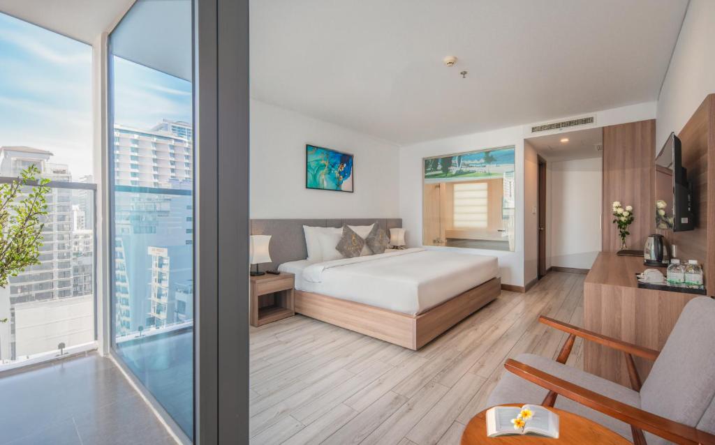 Giường trong phòng chung tại Gosia Hotel