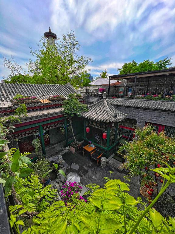 Zahrada ubytování 北京悦明元星空白塔景观四合院民宿