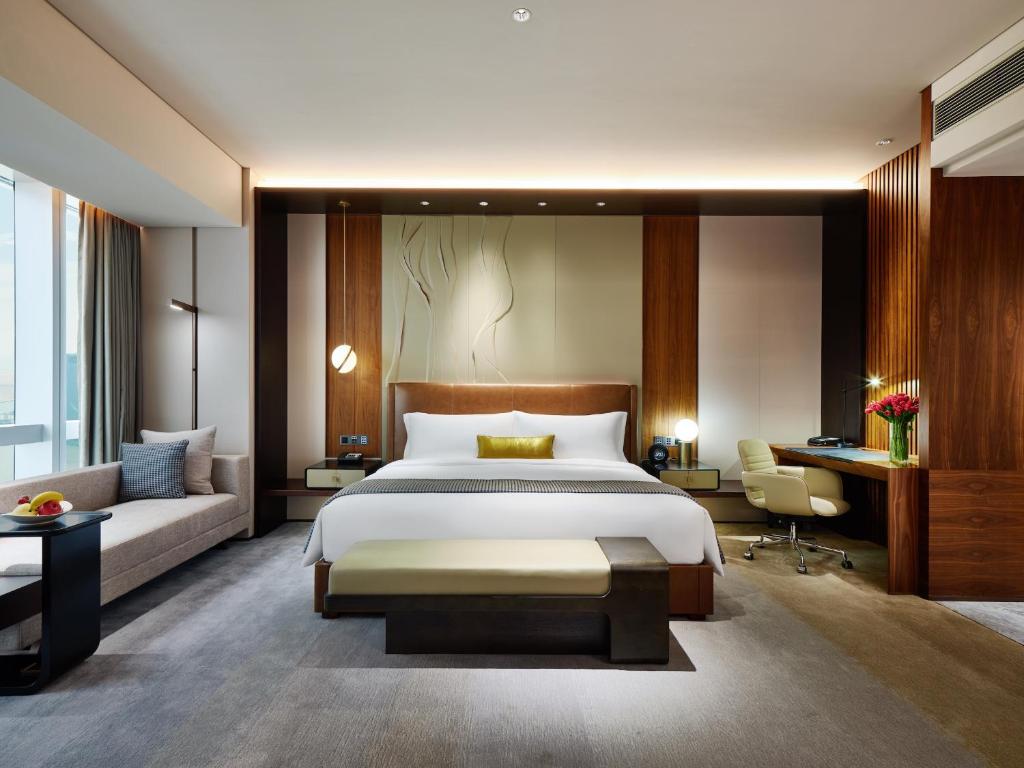 Postel nebo postele na pokoji v ubytování InterContinental Zhuhai by IHG