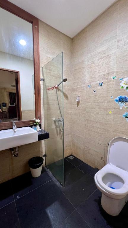 Koupelna v ubytování Vimala Hills Villa & Resort Megamendung Puncak