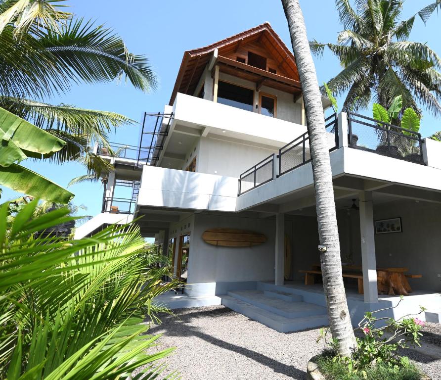 - une vue sur la maison depuis la plage dans l'établissement Sanava Balian, à Balian