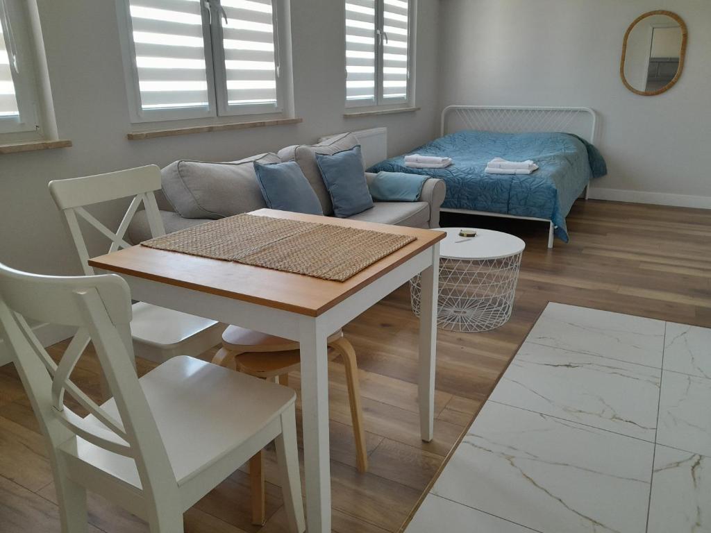 Posedenie v ubytovaní Nowe Apartamenty na Gryfa