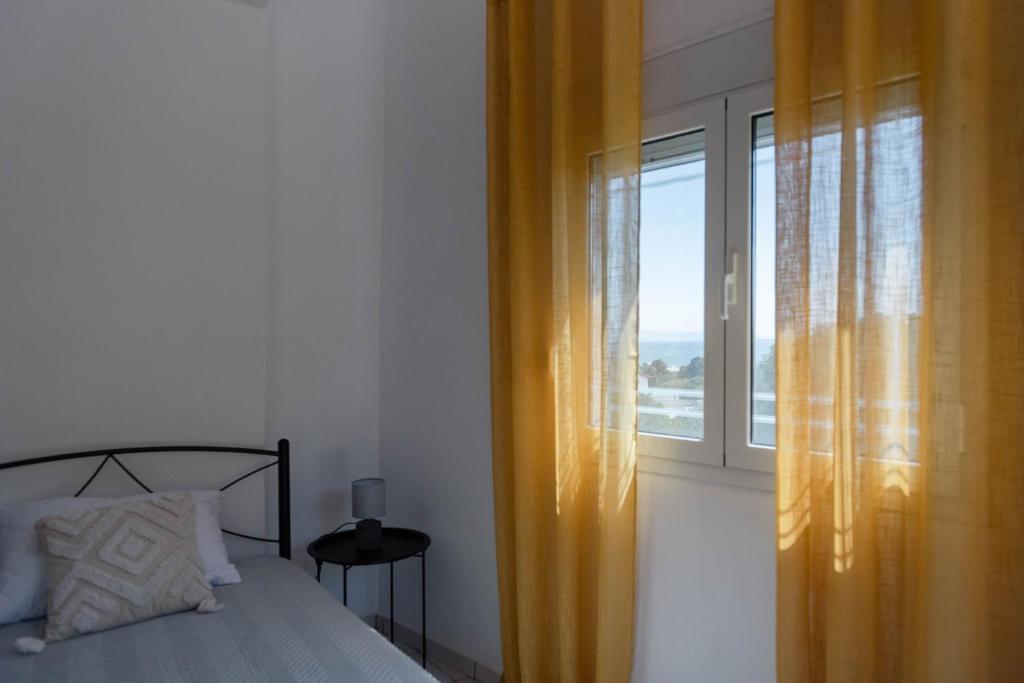 Кровать или кровати в номере Muses_Calliope, Chios