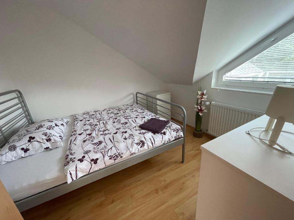 Postel nebo postele na pokoji v ubytování Apartmány Bella Moravia