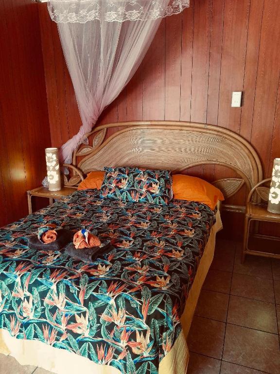 Postel nebo postele na pokoji v ubytování Monita villa Tiputa