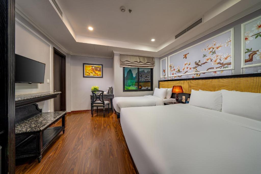 TV a/nebo společenská místnost v ubytování Amara Hanoi Hotel and Spa