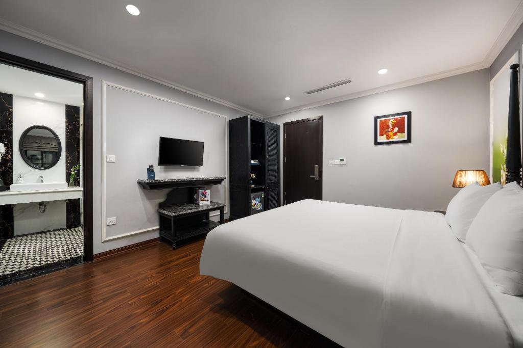 TV a/nebo společenská místnost v ubytování Amara Hanoi Hotel and Spa