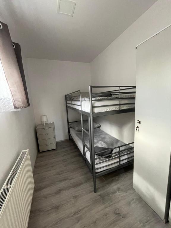 Postel nebo postele na pokoji v ubytování Apartmány Bella Moravia