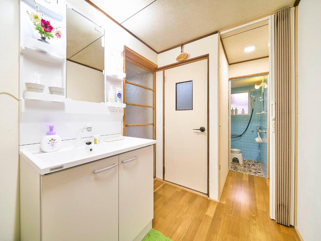 Koupelna v ubytování Kokoyui Guest House