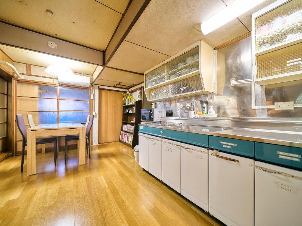 Kuchyň nebo kuchyňský kout v ubytování Kokoyui Guest House