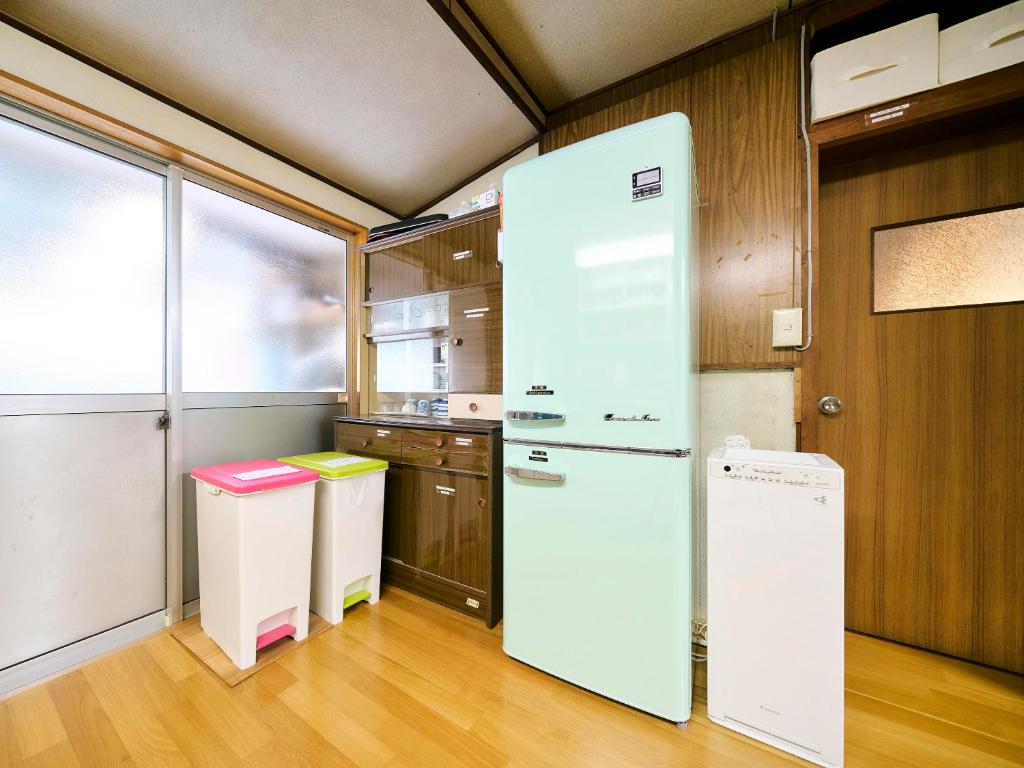 Kuchyň nebo kuchyňský kout v ubytování Kokoyui Guest House