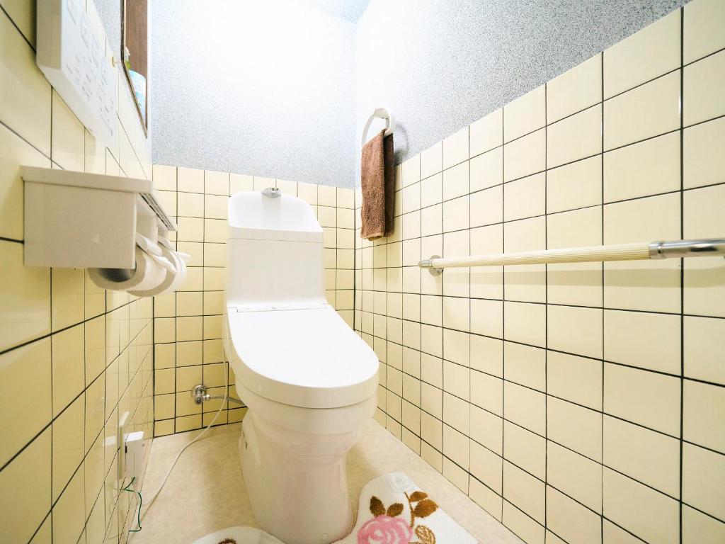 Koupelna v ubytování Kokoyui Guest House