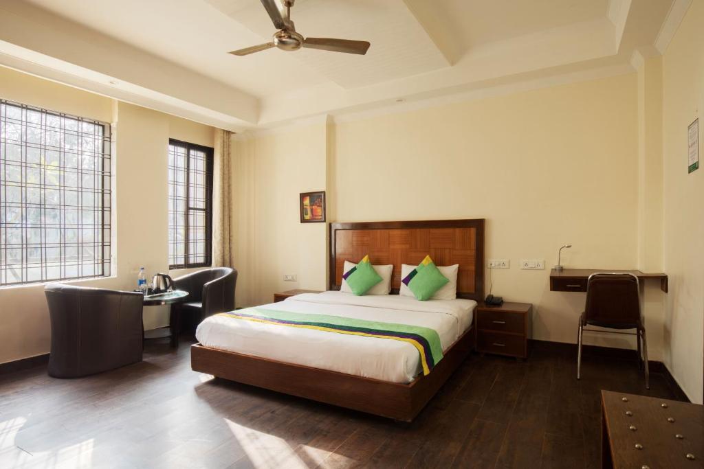 Krevet ili kreveti u jedinici u okviru objekta Treebo Trend White Castle, Gurgaon