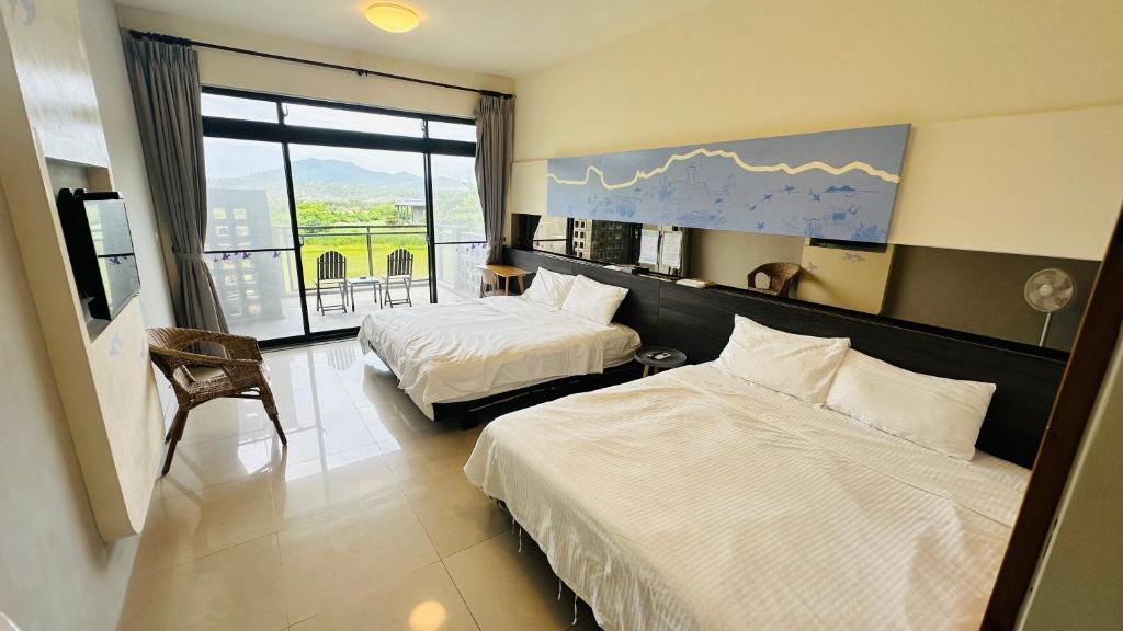 Postel nebo postele na pokoji v ubytování Butterfly B&B
