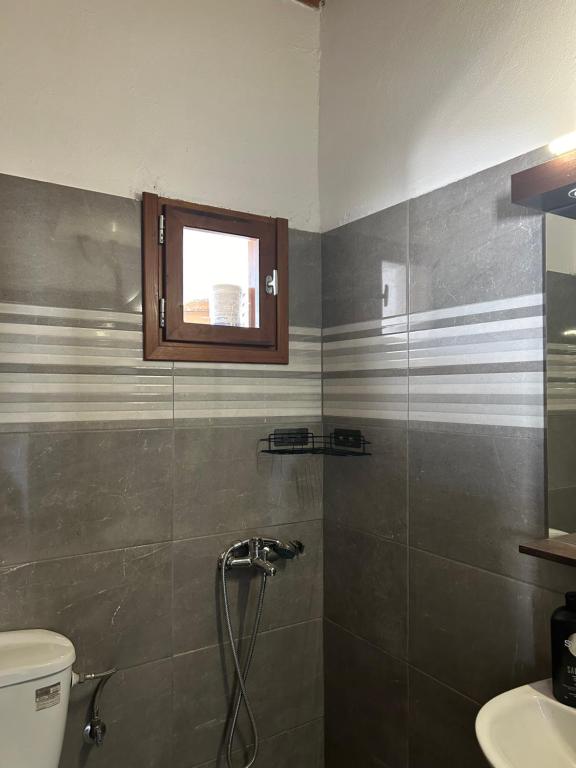 Phòng tắm tại KALLIOPI amari