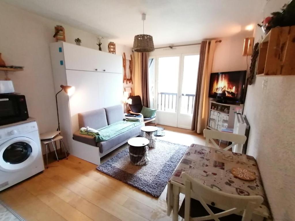 Posezení v ubytování Appartement balcon vue pré et montagne