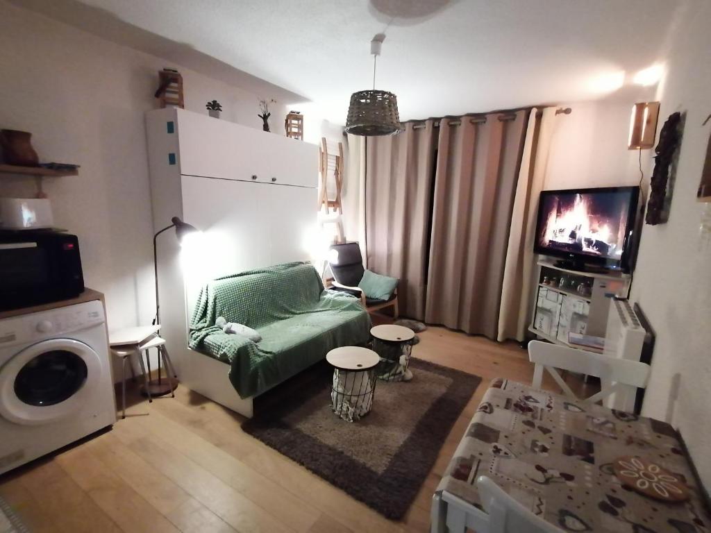Posezení v ubytování Appartement balcon vue pré et montagne