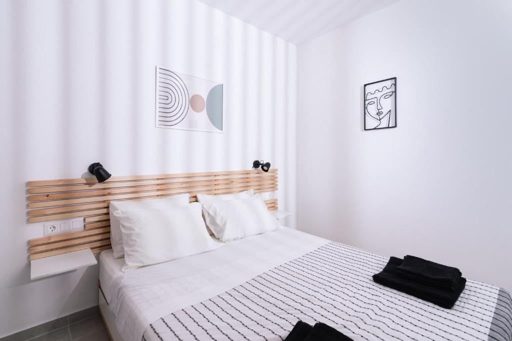 Postel nebo postele na pokoji v ubytování Utopia Luxury Apartment