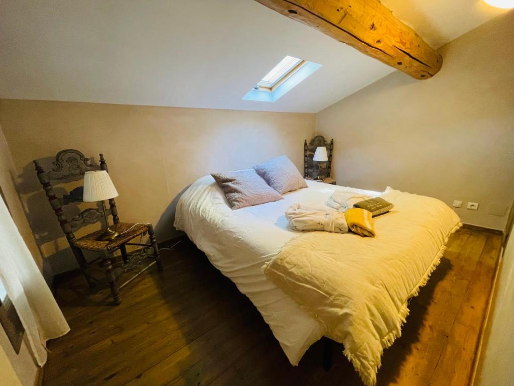 Postel nebo postele na pokoji v ubytování La Bastide des Songes - Demeure d'hôtes