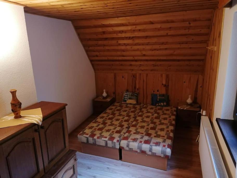 Postel nebo postele na pokoji v ubytování Chata Studnička