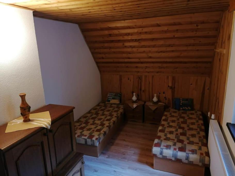 Postel nebo postele na pokoji v ubytování Chata Studnička