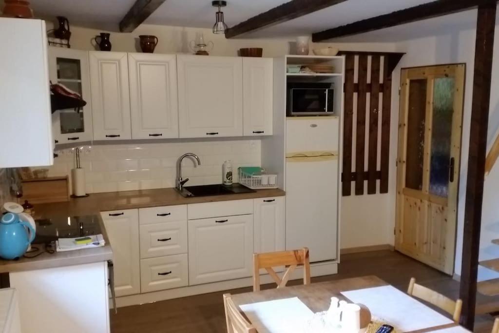 Kuchyň nebo kuchyňský kout v ubytování Chata Studnička