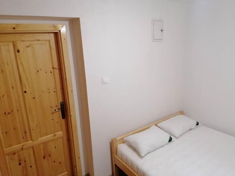 Postel nebo postele na pokoji v ubytování Chata Studnička