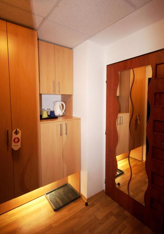 TV a/nebo společenská místnost v ubytování Hotel Garni Rambousek