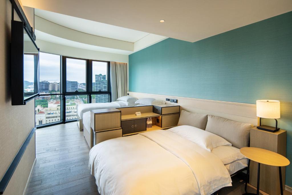 Postel nebo postele na pokoji v ubytování Artyzen Habitat Hengqin Zhuhai