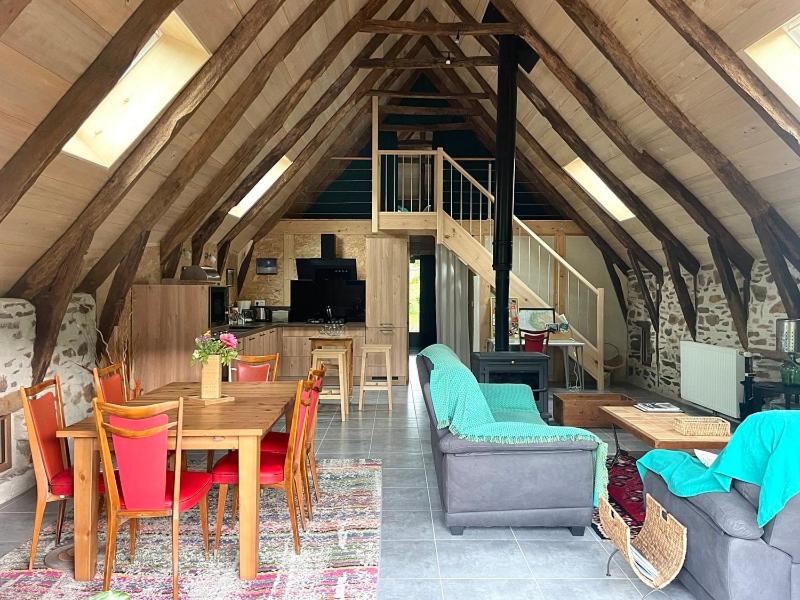 Posezení v ubytování Gîte Le Couderc de Coubisou, grange rénovée