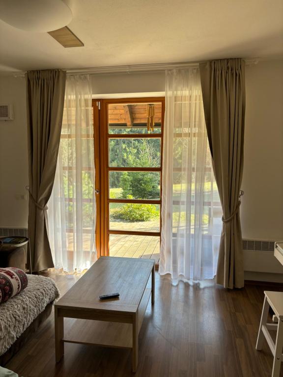 Postel nebo postele na pokoji v ubytování Apartmán Vratička Říčky v Orlických horách