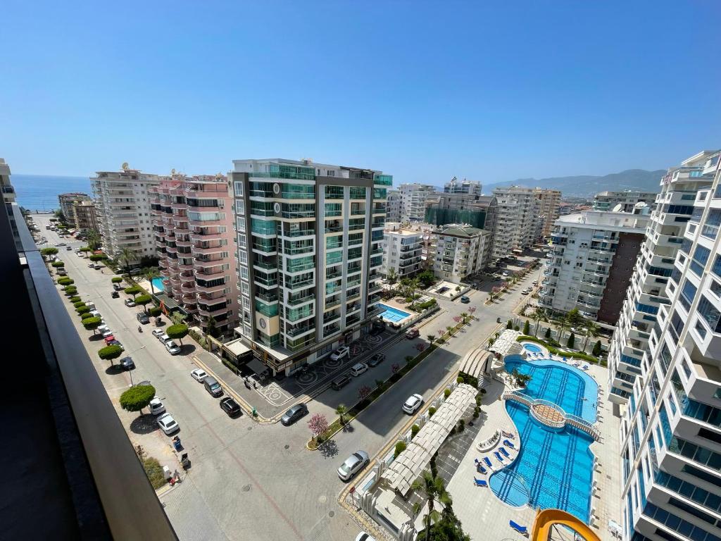 an aerial view of a city with buildings and a street at SA Apartments! 1bd Flat 300m to the Beach in Alanya