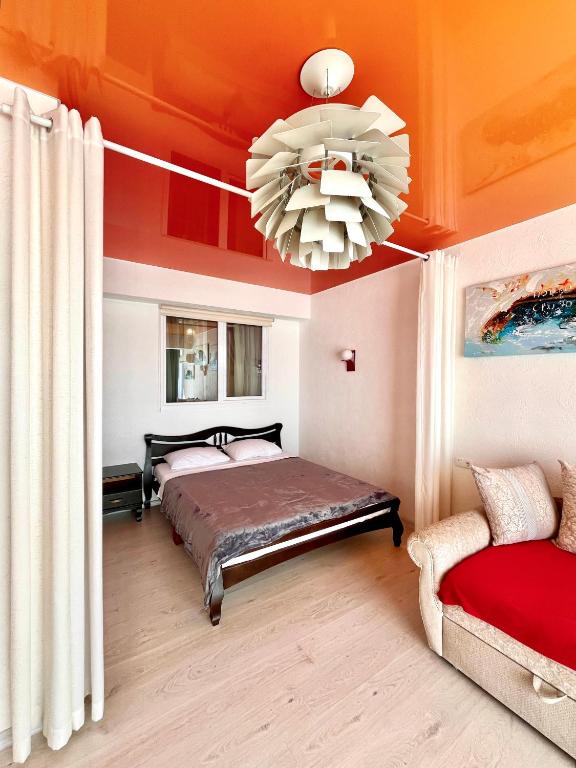 Postel nebo postele na pokoji v ubytování DONE KANDYBONE Apartments