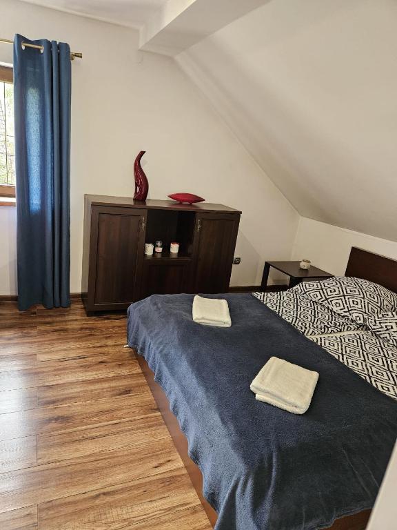 Postel nebo postele na pokoji v ubytování Willa Olivia