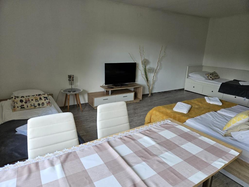 Postel nebo postele na pokoji v ubytování Willa Olivia