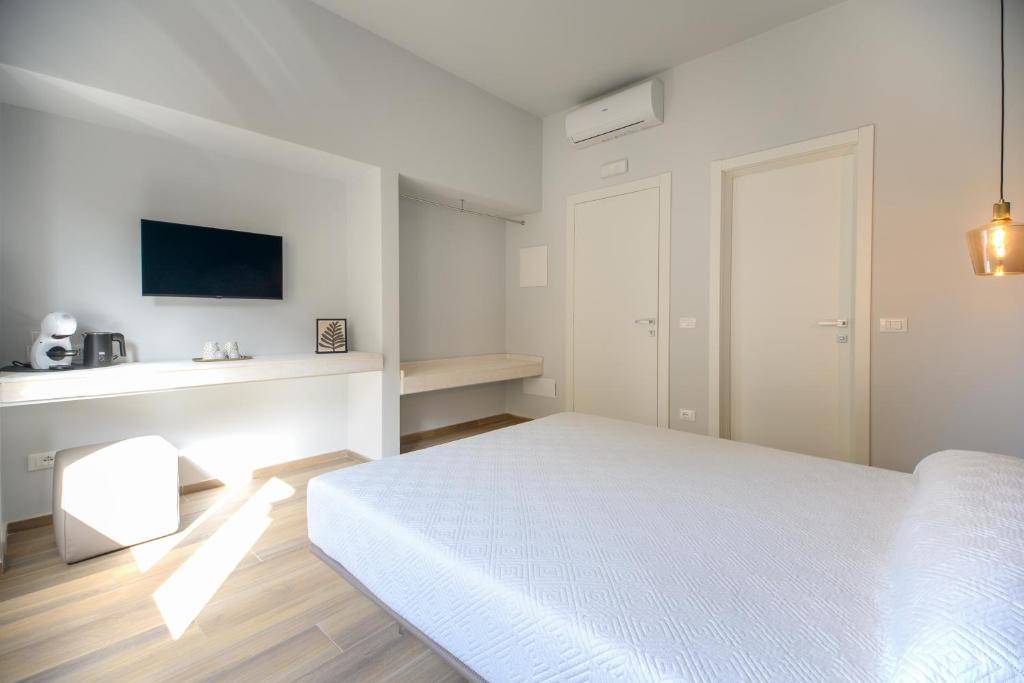 Postel nebo postele na pokoji v ubytování Bianca Elegance Rooms