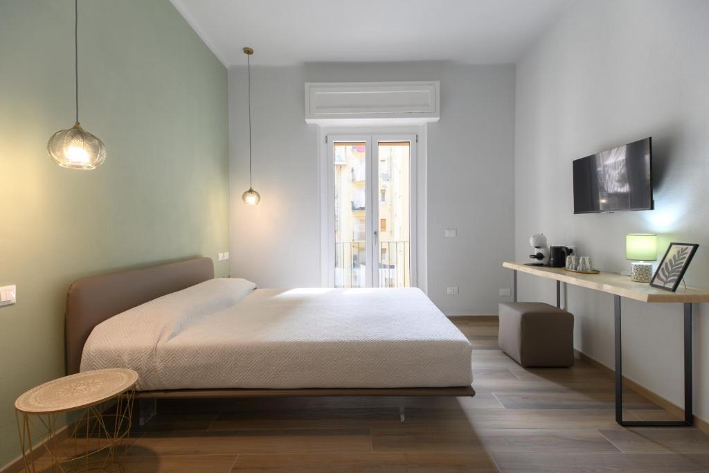 Postel nebo postele na pokoji v ubytování Bianca Elegance Rooms